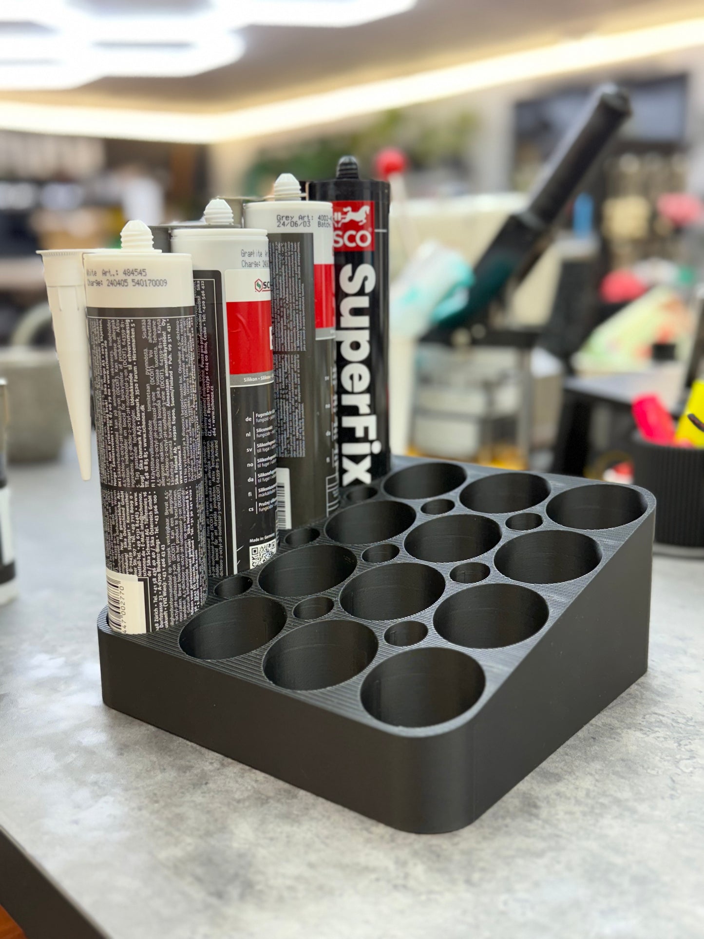 Silikontube holder